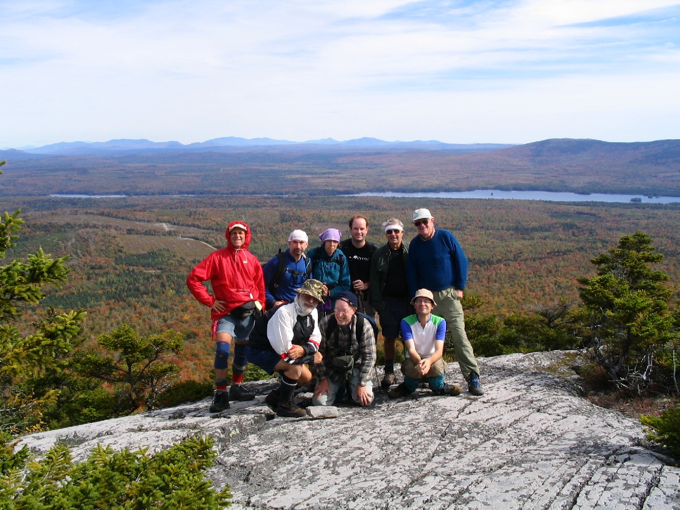 29.7 MM. Here we are at the summit of Pleasant Pond Mountain looking back and down at Moxie Pond. Front row - Dean Gletsos, Aaron Schoenberg, Chris Senko. Back row - Ludwig Hendel, David Kahan, Veronica Cilich, Josh Davis, George Sheedy and George Perkinson. Courtesy askus3@optonline.net